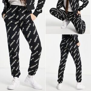 Women's adidas all over logo Originals Monogram Track Pants sweatpants Large